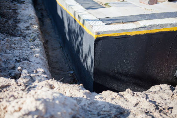 Professional Waterproofing technician working in Cincinnati, OH